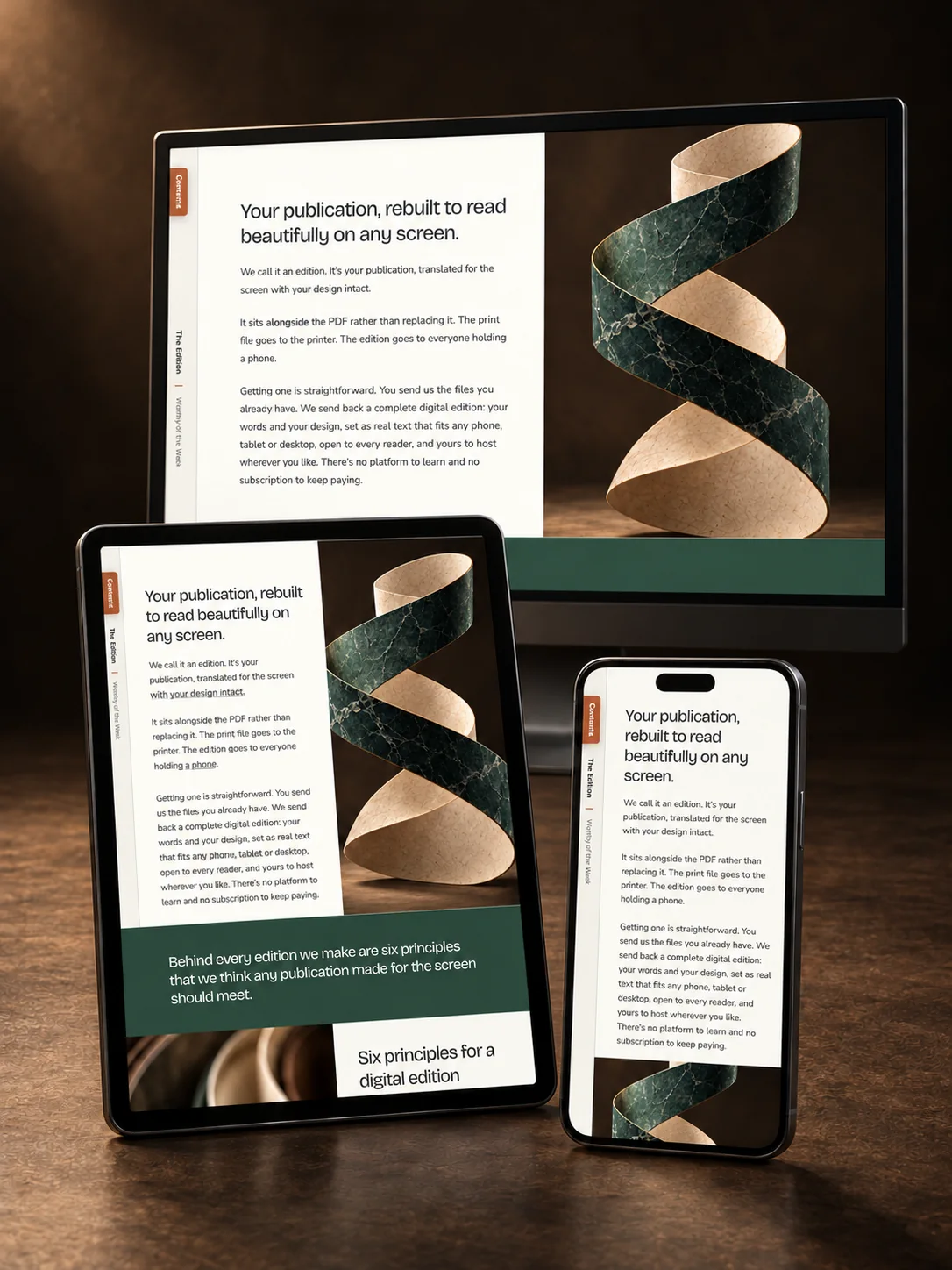 This edition shown on a desktop monitor, a tablet and a phone, each with the same opening page laid out to fit its screen